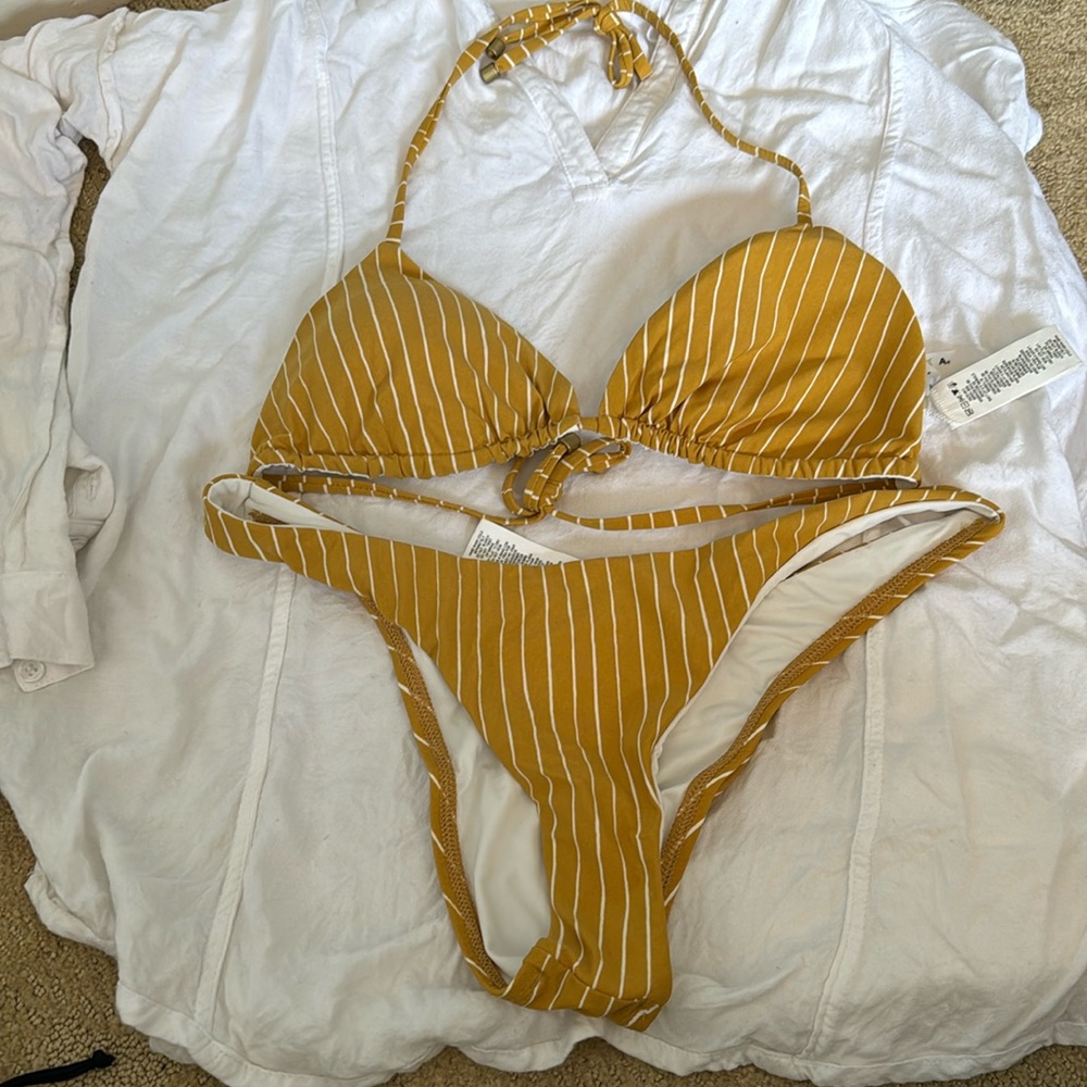 Brand new vitamin A yellow striped bikini size medium/8. Never worn!